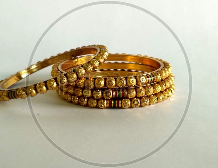 Attractive Golden Glass Bangles In Indian Traditional Day Decoration Bracelets