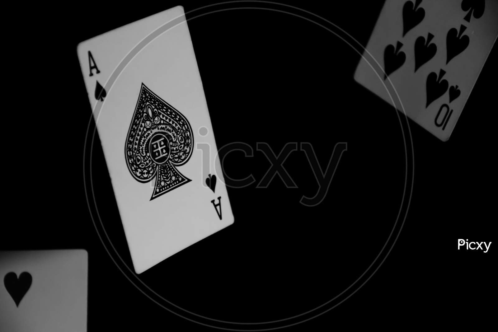 Image of Black And White Photograph Of Ace Of Spades On A Black Background -AD940658-Picxy