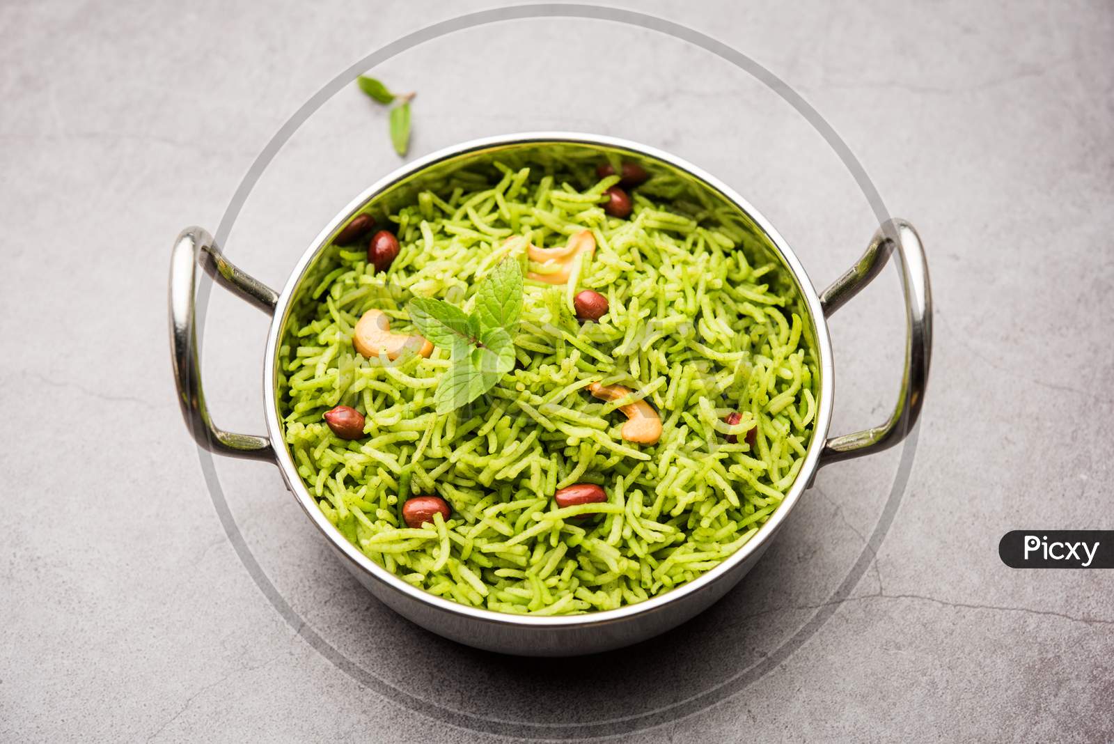 Mint Rice Or Pudina Flavoured Pulao, Served In A Bowl
