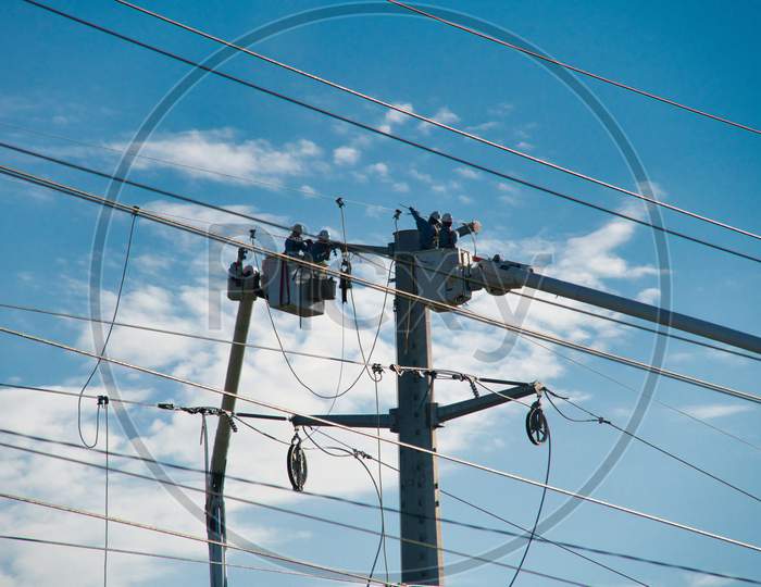 Electrical Line Workers Repair Storm Damage
