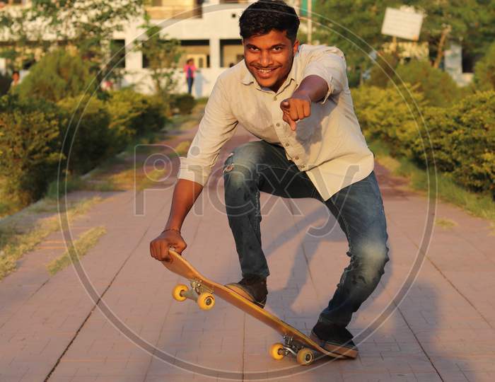 Indian Boy Portrait on Skate board
