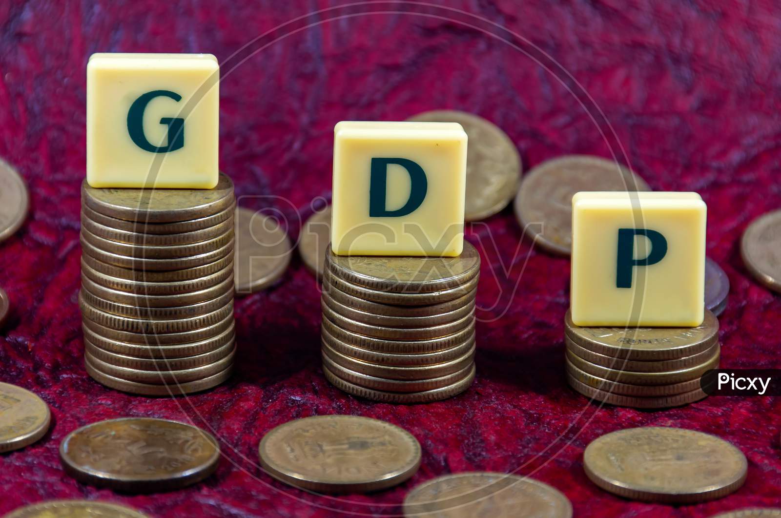 Gross domestic product or GDP word design with Indian five rupee coin for various type of financial transaction or stock market option
