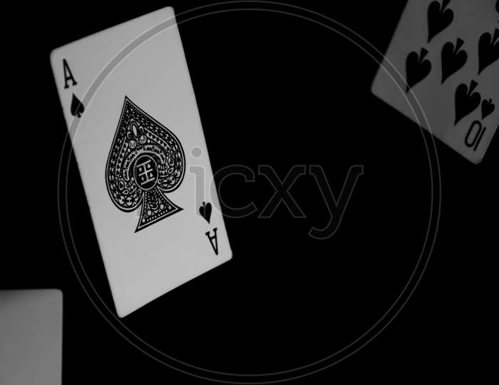 Black And White Photograph Of Ace Of Spades On A Black Background