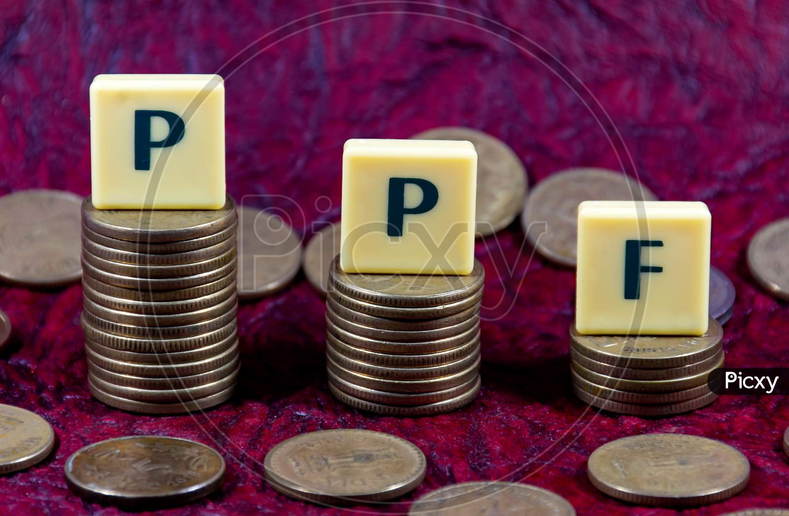 Public provident fund or PPF word design with Indian five rupee coin for various type of financial transaction or stock market option