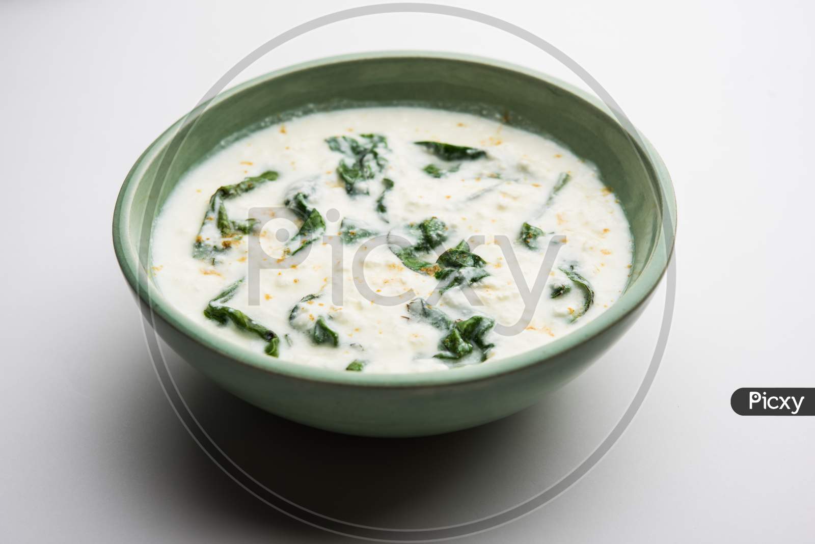Spinach Yogurt Salad Or Palak Raita Served In A Bowl