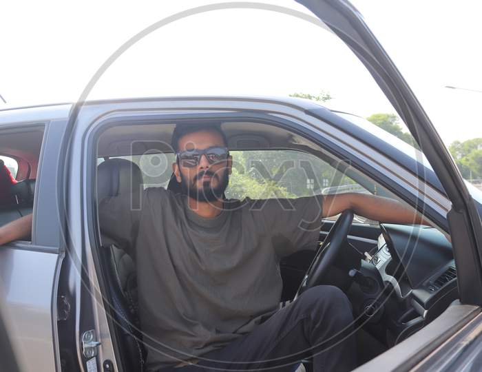 Indian Man Portrait with car