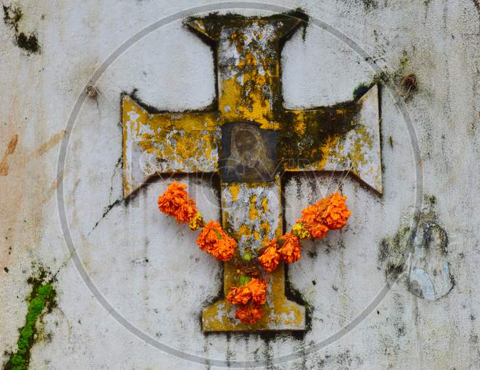 Catholic Cross On Wall With Jesus And Garland