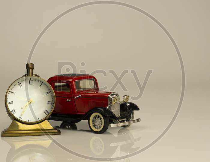 A time clock with red vintage concept card model with nice reflection on white background