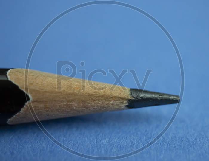 Macro shot of pencil with notebook paper