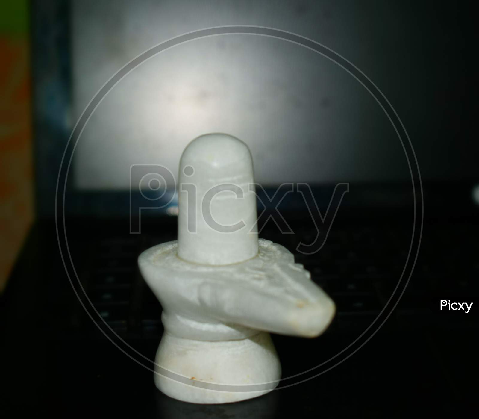 Shiv linga made up of white marble