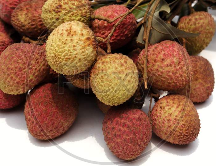 Cluster Of Fresh Lychee Or Litchi With Selective Focus Isolated On White Bckground