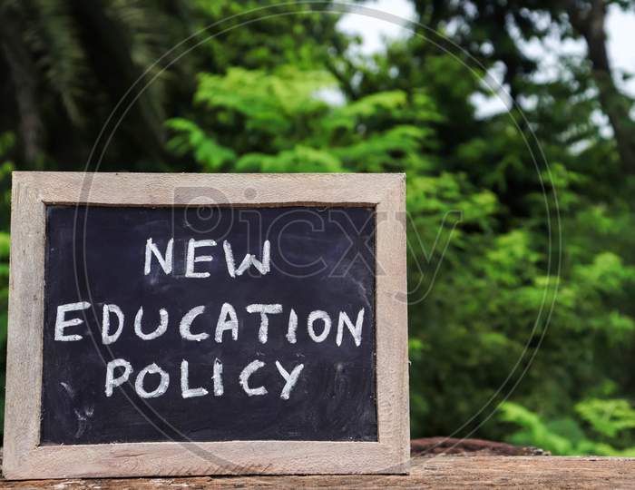New Education Policy Written On Chalkboard With White Chalk