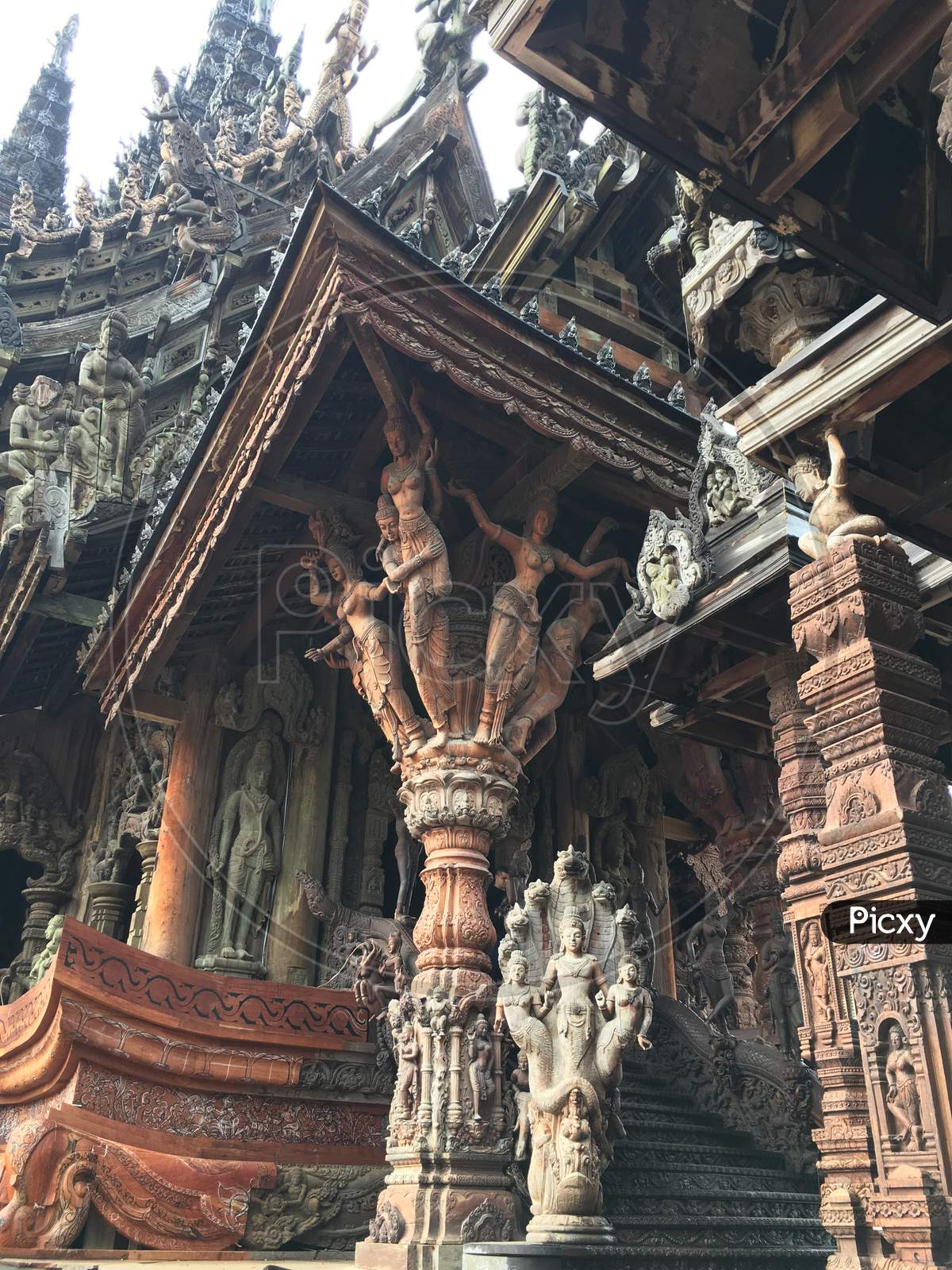 The Sanctuary of Truth is an unfinished Hindu-Buddhist temple and museum in Pattaya, Thailand. It was designed by the Thai businessman Lek Viriyaphan in the Ayutthaya style. It's a must vitis place inThiland and thousands visit to see the magnificient work of wooden sculptures.