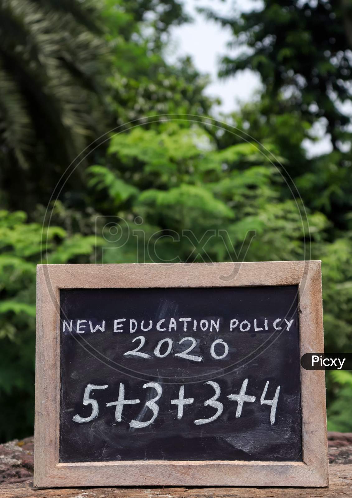 New Education Policy 2020 & Its Structure Written On Chalkboard in Vertical Orientation