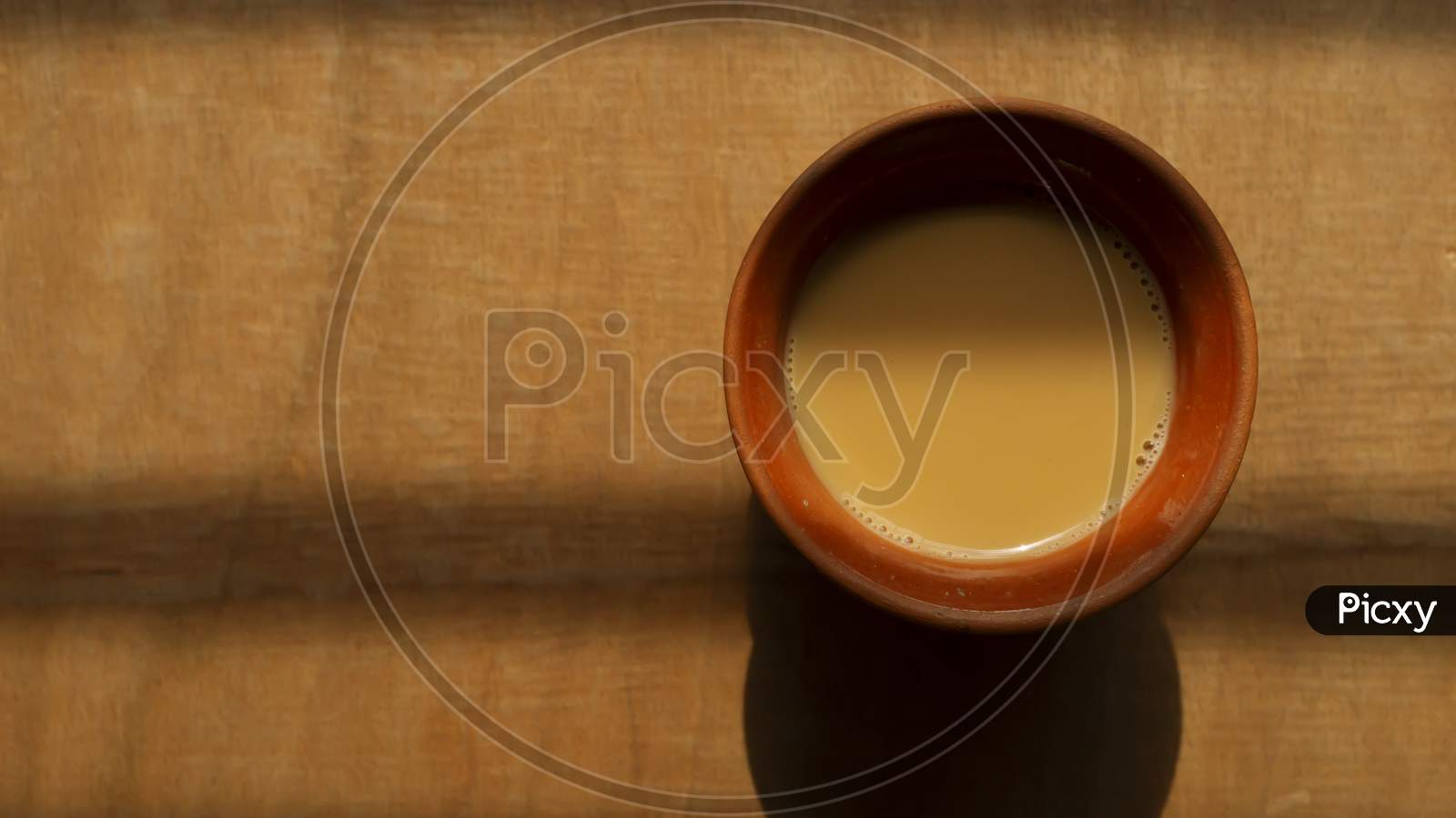 Traditional Indian Tea on a clay tea cup top view