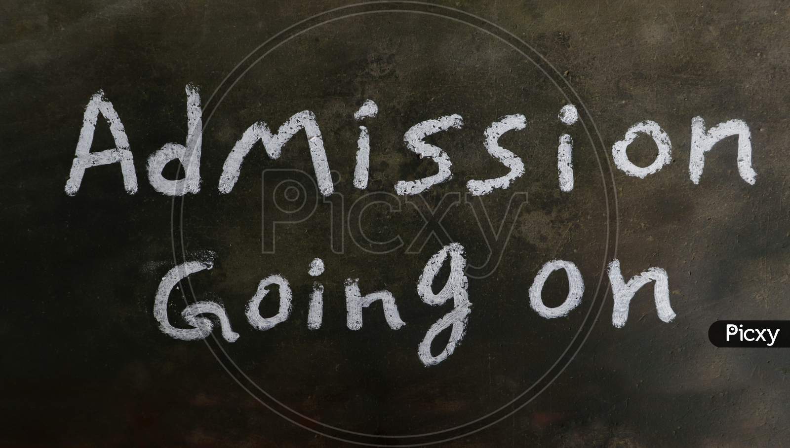 Admission Going On Phrase Written On Blackboard With White Chalk