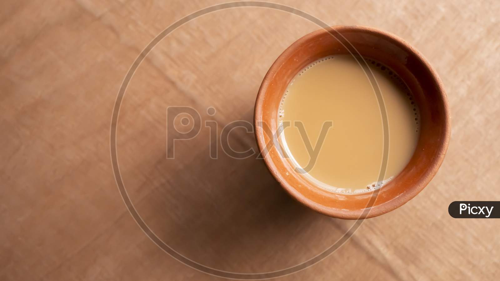 Traditional Indian Tea on a clay tea cup top view