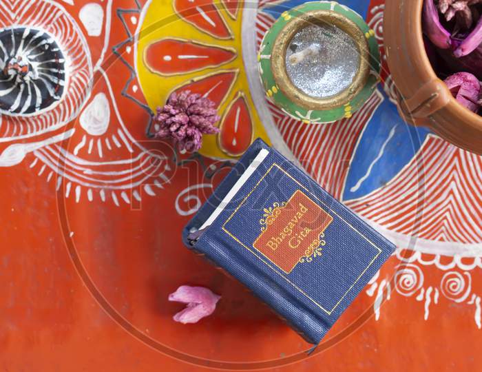 Hindu holy book kept on a decorative background