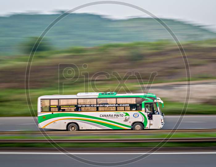 Canara Pinto travels bus , speeding towards Mumbai.