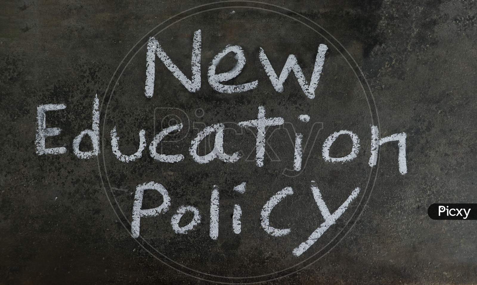 New Education Policy Phrase Written On Blackboard With White Chalk