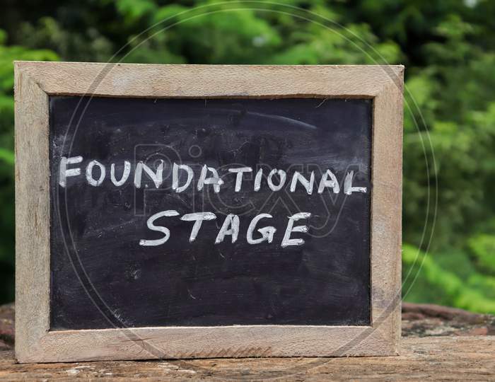 Foundational Stage (India'S New Education Policy 2020) Written On Chalkboard With White Chalk