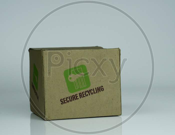An used recyclable cardboard carton on isolated background