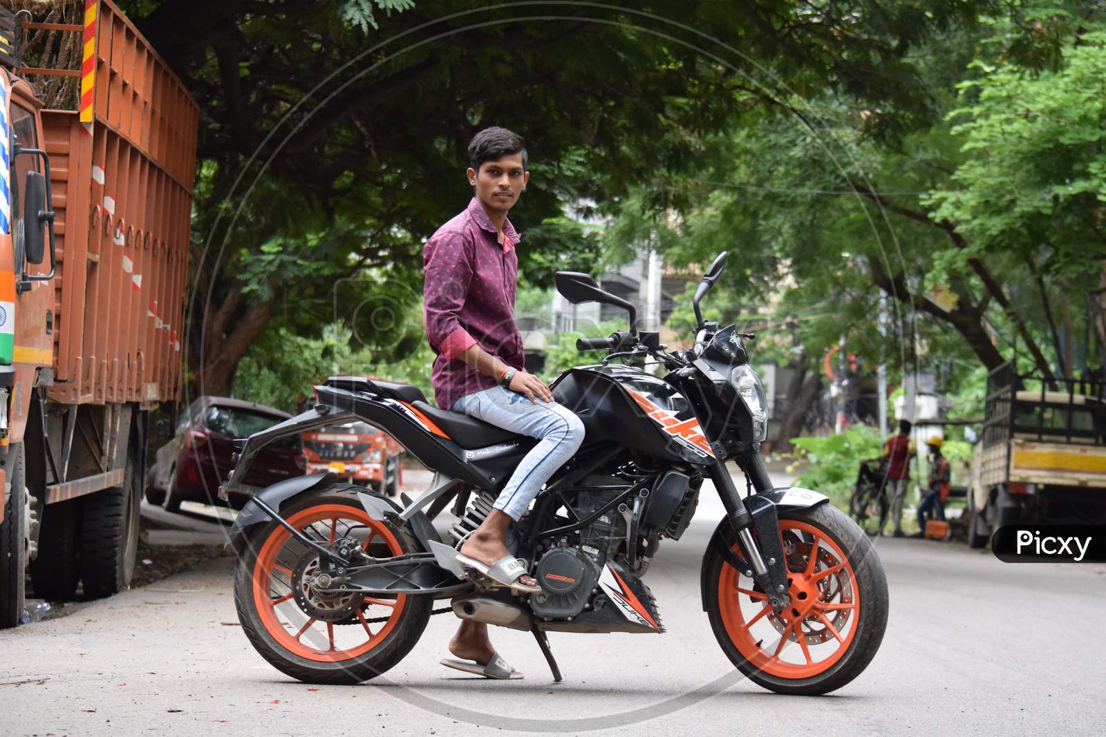 Hyderabad, Telangana, India. August-07-2020: Portrait Of Young Man At Outdoor, Young Man Posing On Bike