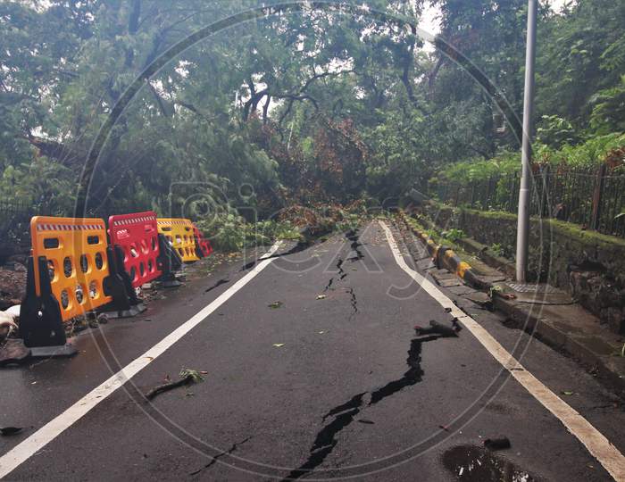A road gets cracked open, following heavy rainfall in Mumbai, India on August 6, 2020.