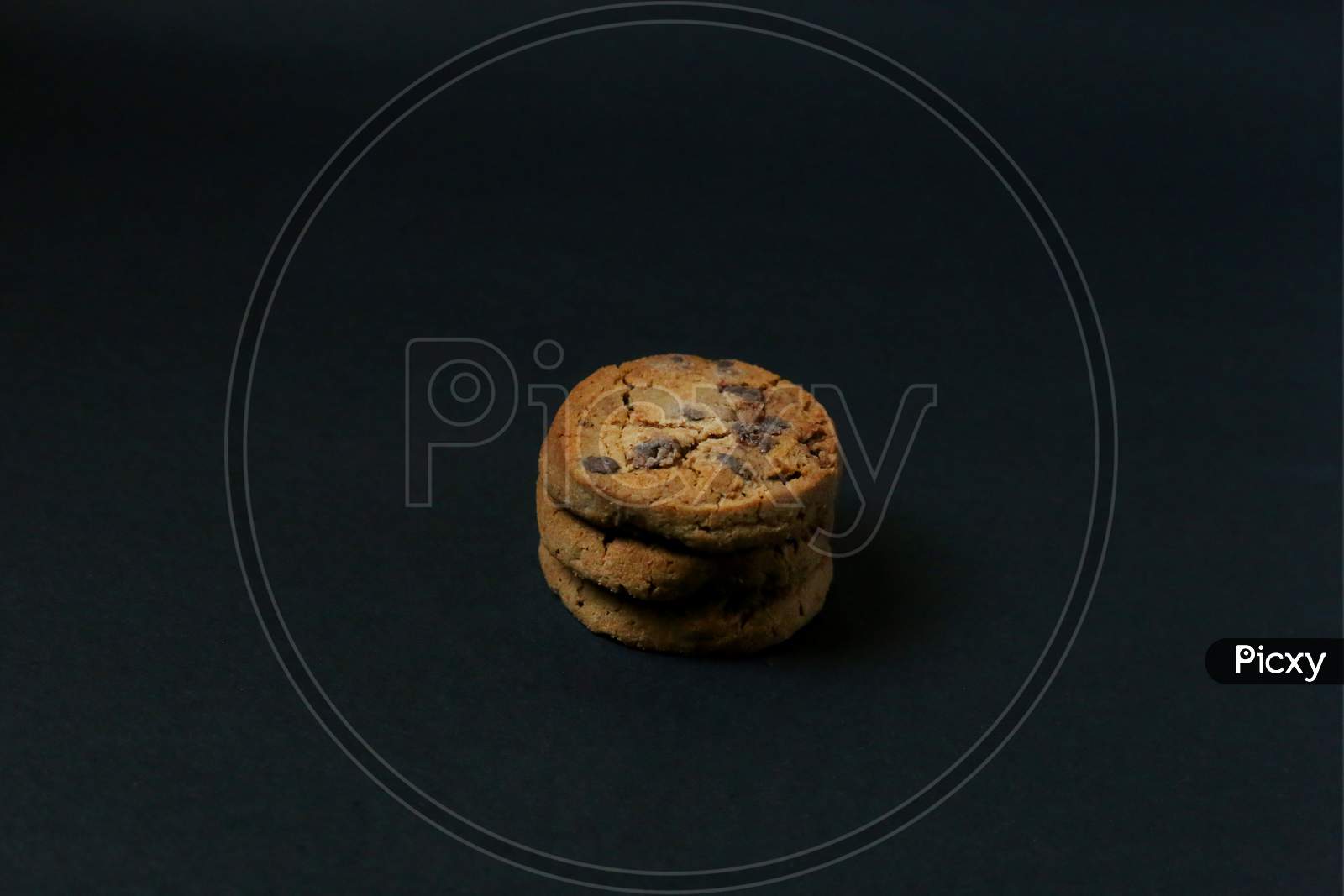 Chocolate Chip Cookies Isolated On Black Background