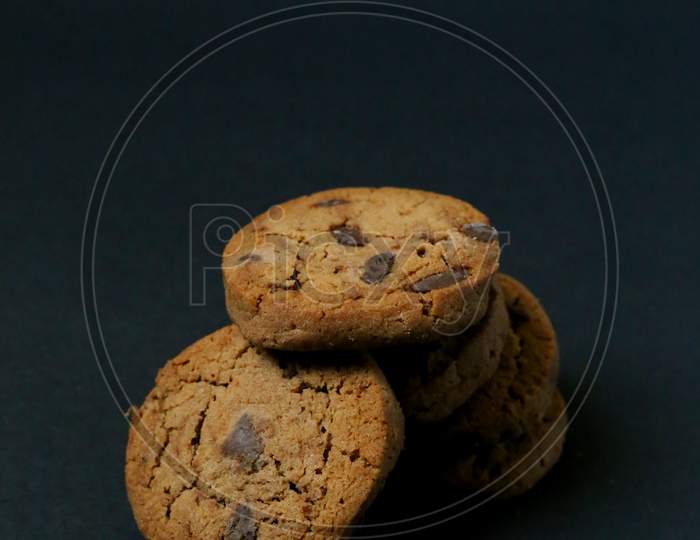 Chocolate Chip Cookies Isolated On Black Background