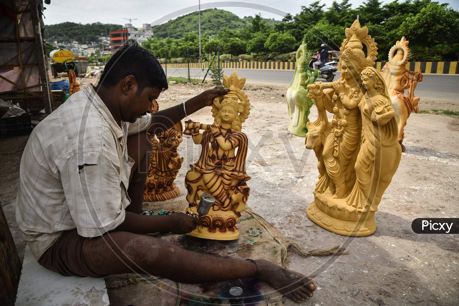 An Artist Prepares An Idol Of Hindu God Krishna Ahead Of The Krishnashtami Festival, In Vijayawada, August 08, 2020.