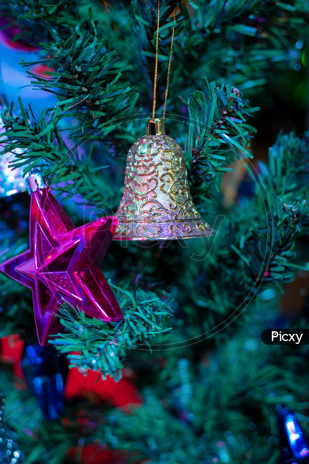 Decorated Christmas Tree On Blurred Background.