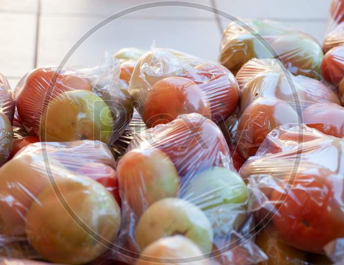 Ripe Tomatoes Packaged.Stacked Together