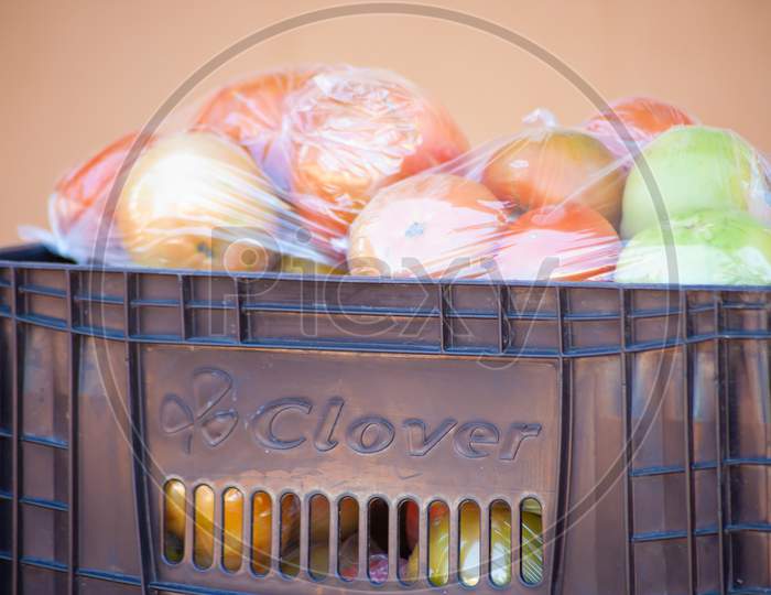 Red Ripe Tomatoes Packaged On A Crate