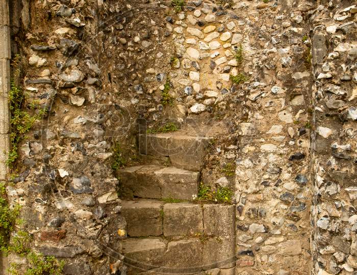 Flint Stone And Sandstone Spiral Stair Case In Medieval Ruins