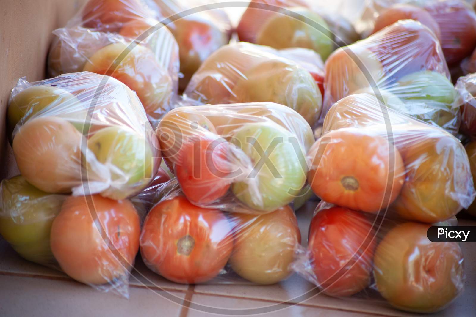 Ripe Tomatoes Packaged.Stacked Together