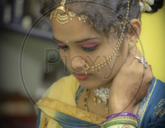 Gorgeous Youth Woman With Traditional Cloths