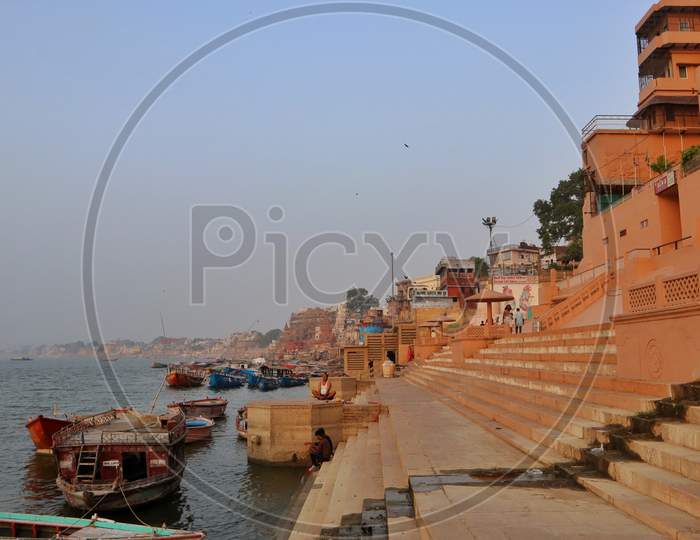 Landscape view of the ghats of Varanasi, at the bank of river Ganges with selective focus.
