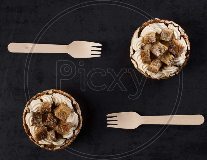 Two Banofee High Banana Pie With Wooden Disposable Fork