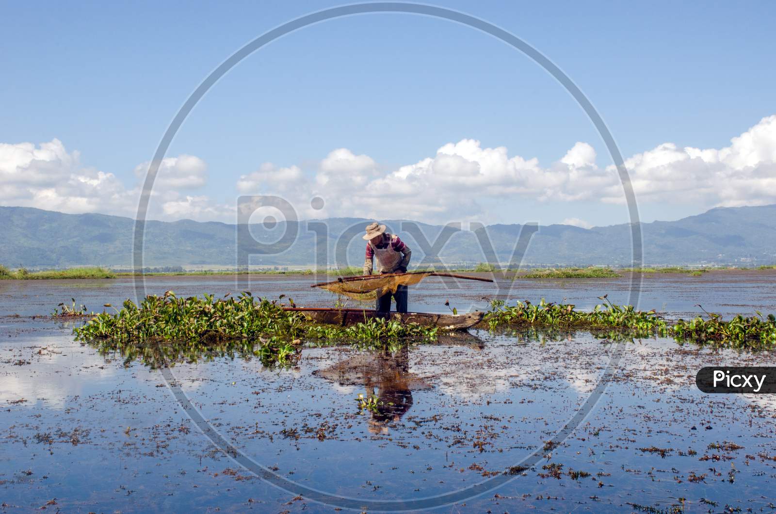 beautiful loktak lake and fisherman