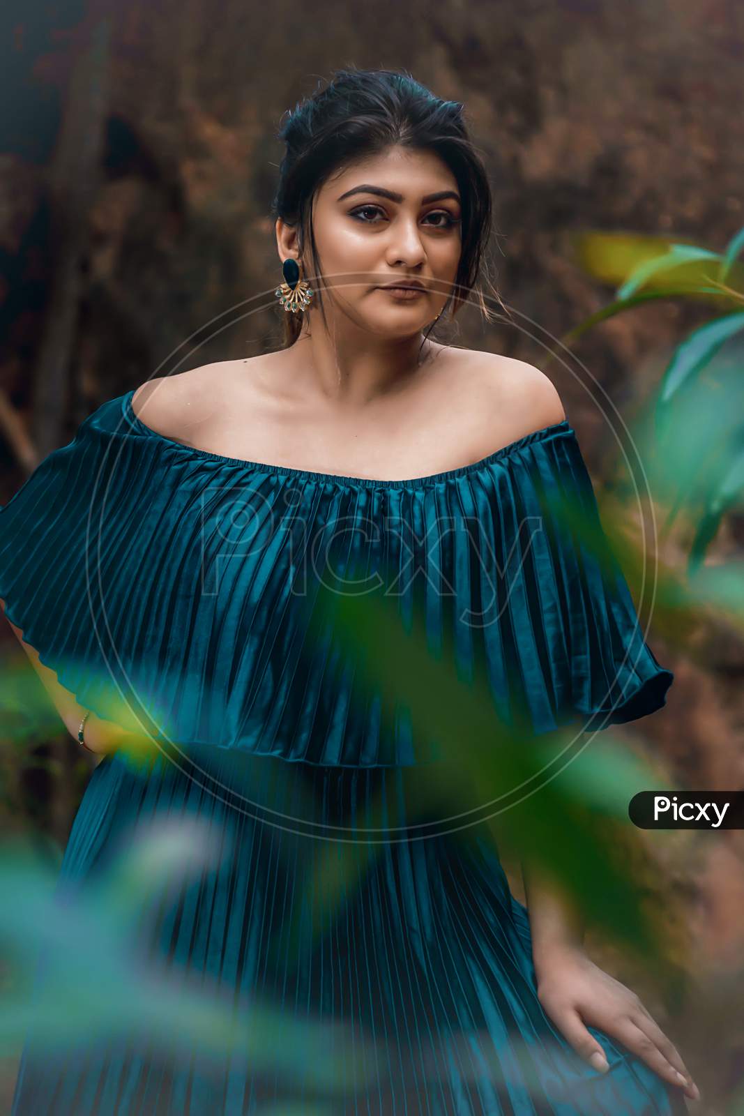 Shantiniketan, India. Fashion Portrait Of Beautiful Indian Young Girl, Moody Colors, Wearing A Blue Western Dress. Indian Lifestyle And Fashion. September 2019