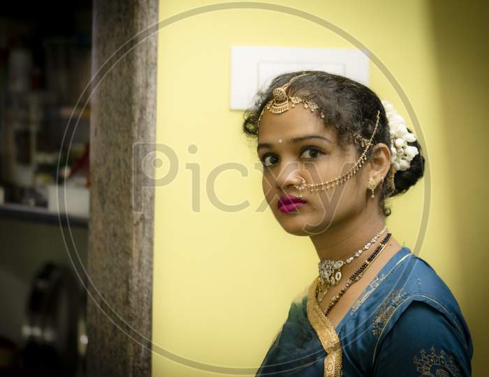 Gorgeous South Indian Woman With Red Lipstick On Lips