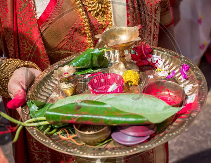 A Women Holding A Borondala (Pooja Thali For Worshipping God) In Sindur Khela At A Puja Pandal On The Last Day Of Durga Puja.