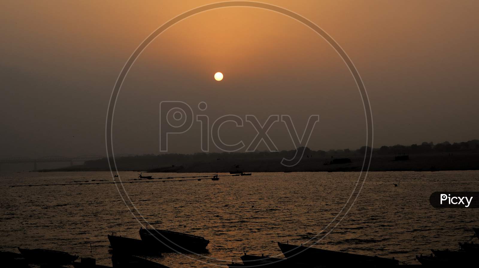 Landscape view of the ghats of Varanasi, at the bank of river Ganges with selective focus.