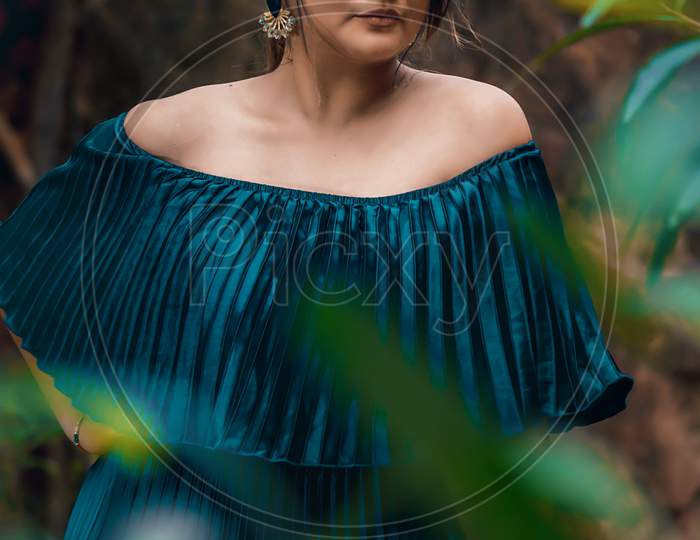 Shantiniketan, India. Fashion Portrait Of Beautiful Indian Young Girl, Moody Colors, Wearing A Blue Western Dress. Indian Lifestyle And Fashion. September 2019