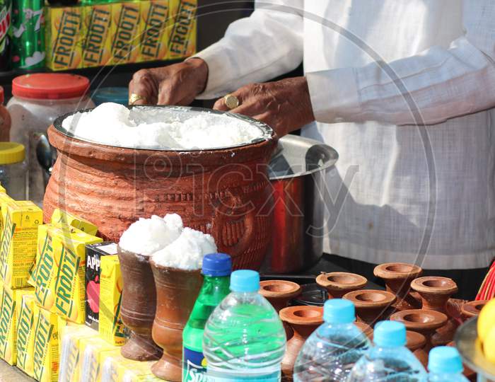 Man is selling lassi at the Mahabaleshwar