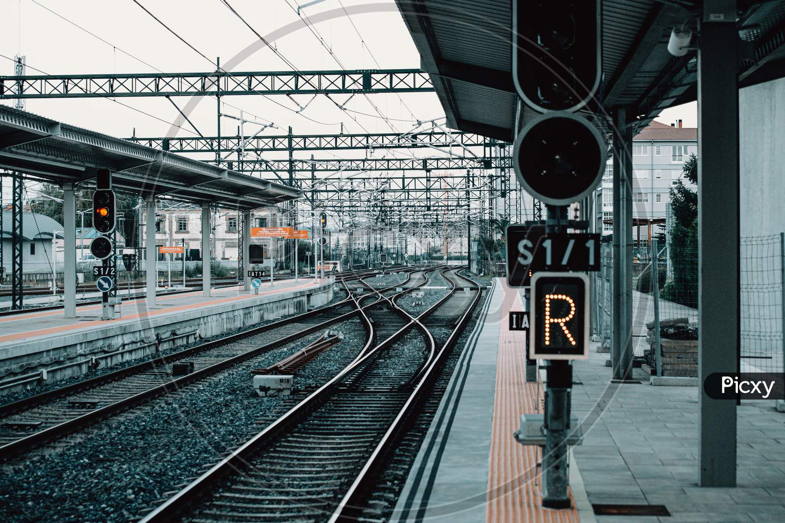 An Horizontal Shot Of A Train Station With The Rails