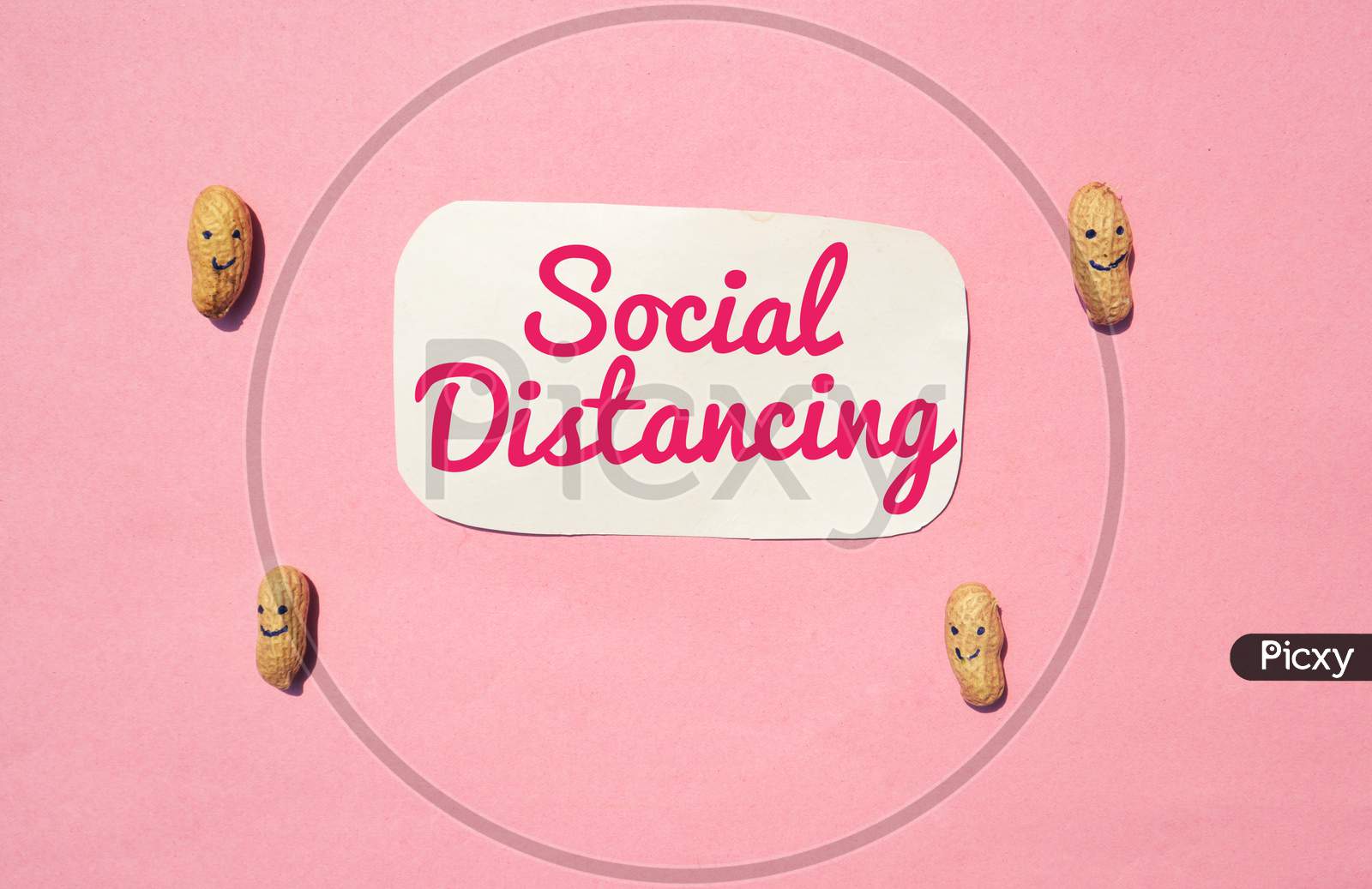 Social Distancing Or Safe Distance Conceptual Photo Due To Coronavirus Or Covid-19 With Peanuts Made Characters On Pink Background