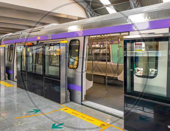 Metro Train Stopping At A Station And Open The Door To Wait For Passengers To Enter During The Rush Hour At Metro Station Of Kolkata East West Metro System In Kolkata On January 2020