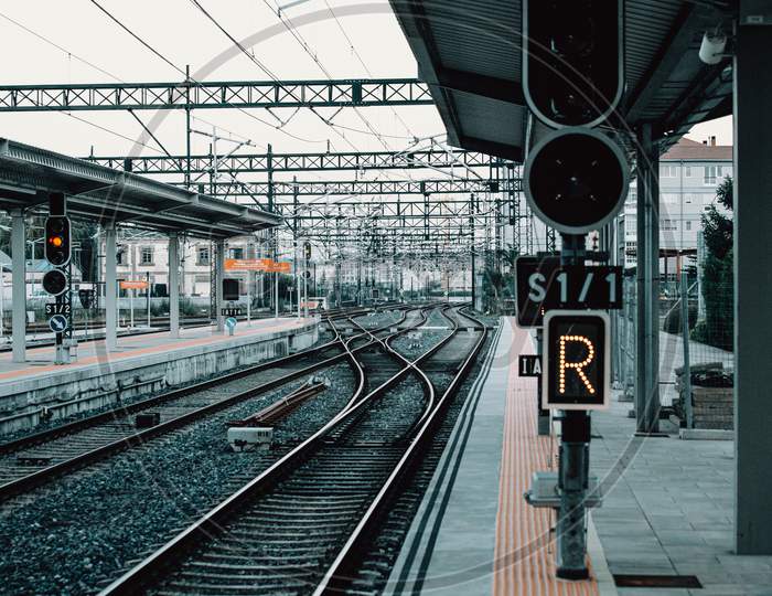 An Horizontal Shot Of A Train Station With The Rails